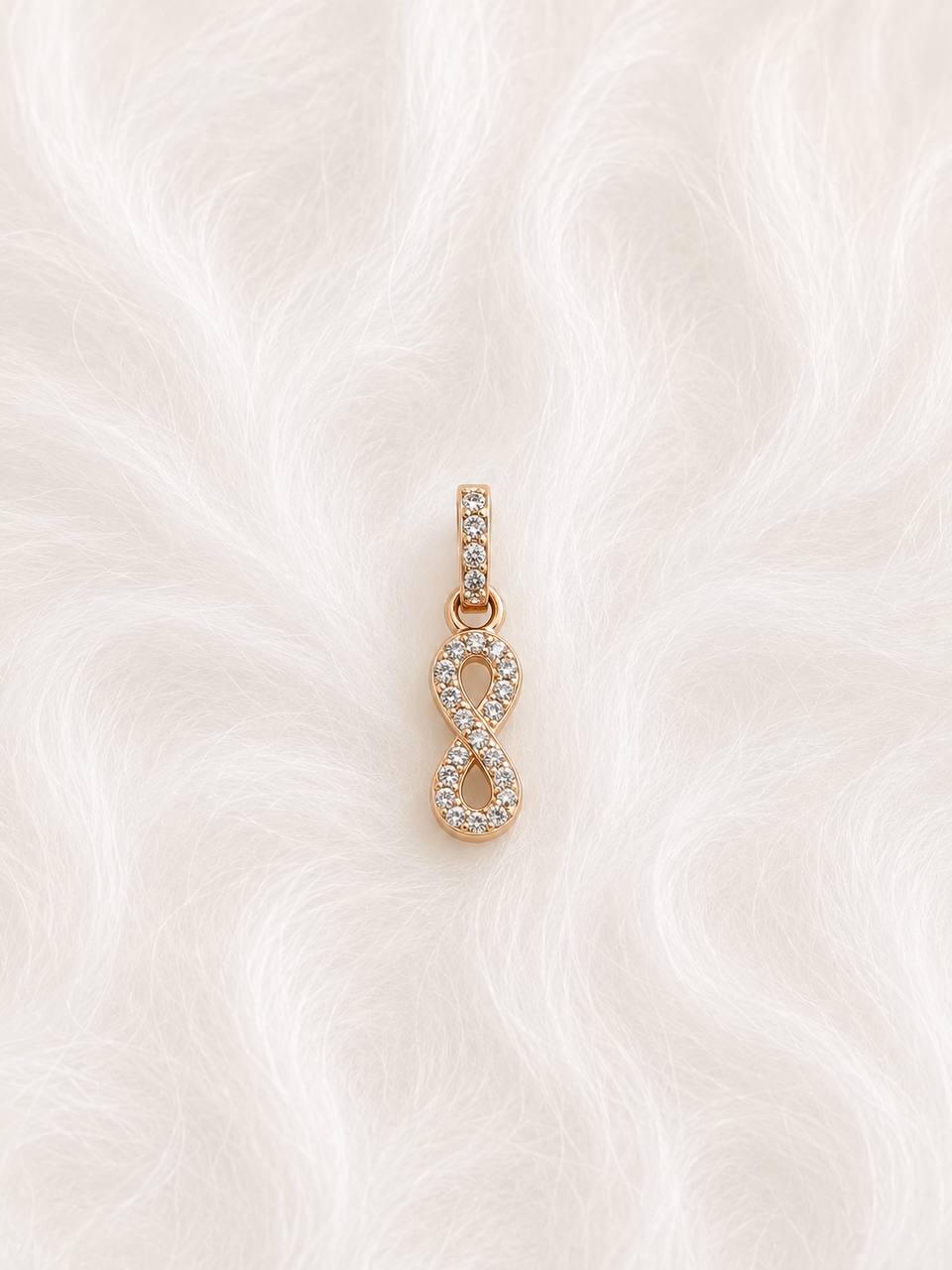 Silver infinity pendant with rosegold finish