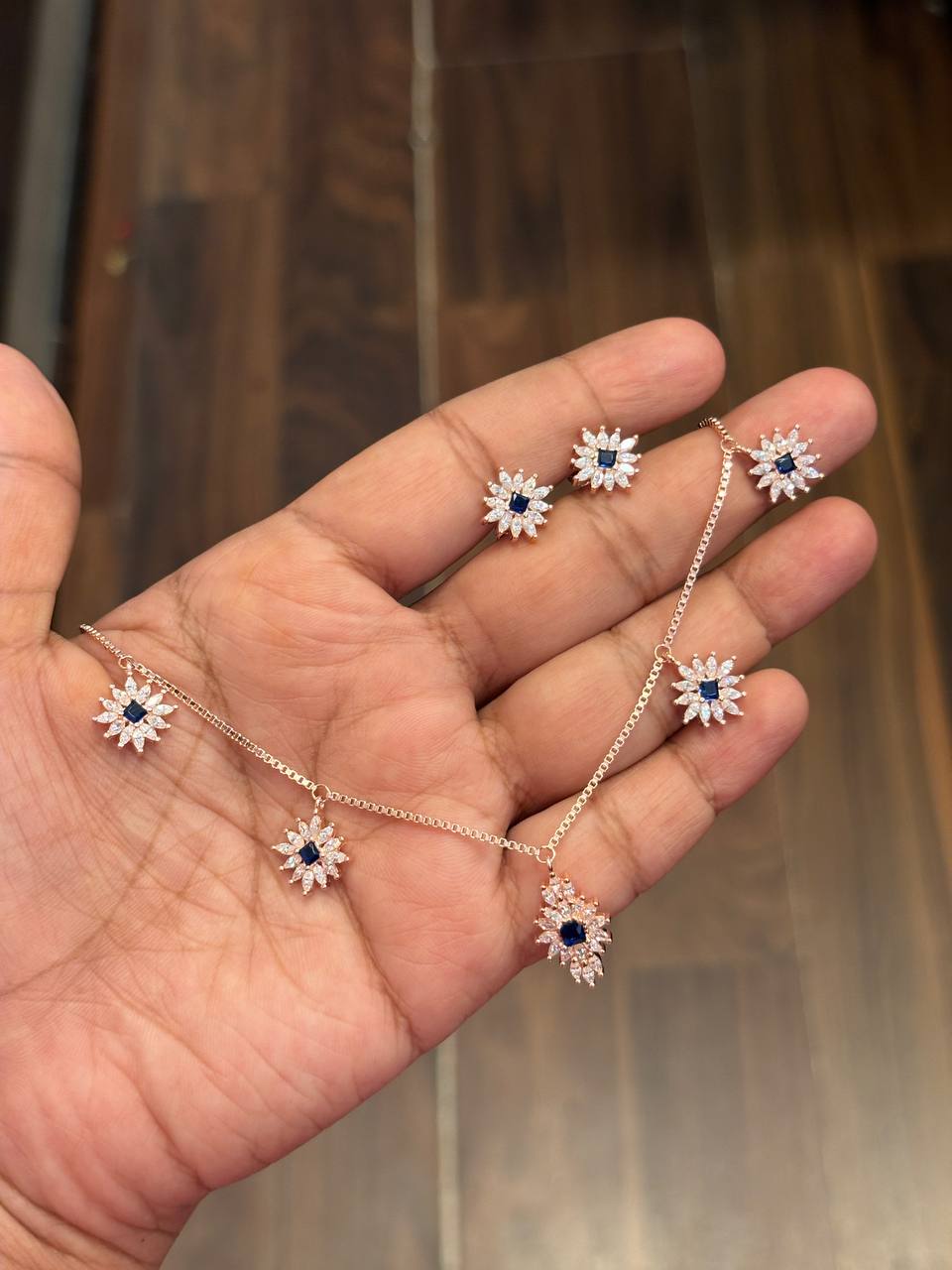 Silver blue marvel charm with rosegold finish