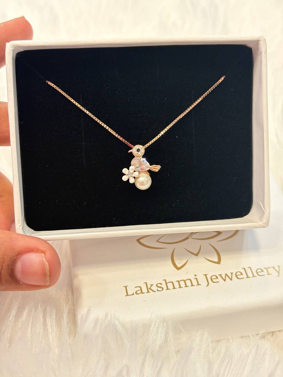 Silver pearl bird with rosegold finish