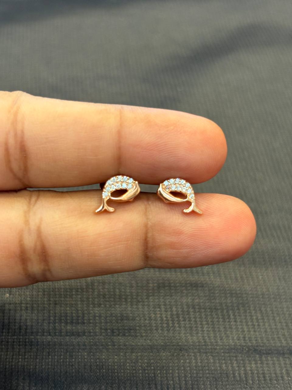 Silver dolphin stud with rosegold finish