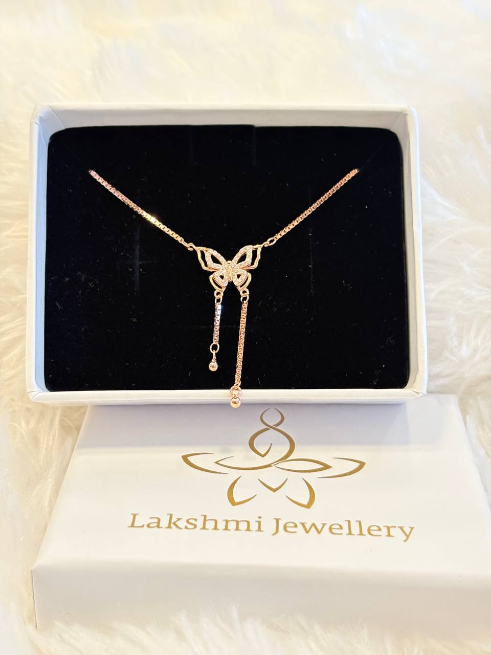 Silver butterfly hanging with rosegold finish