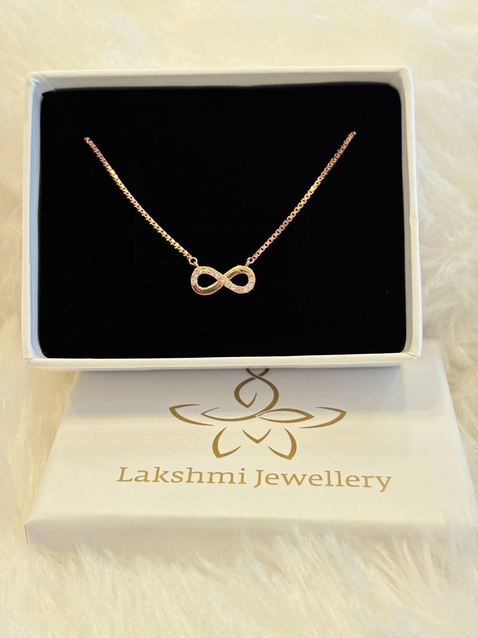 Silver infinity chainn with rosegold finish