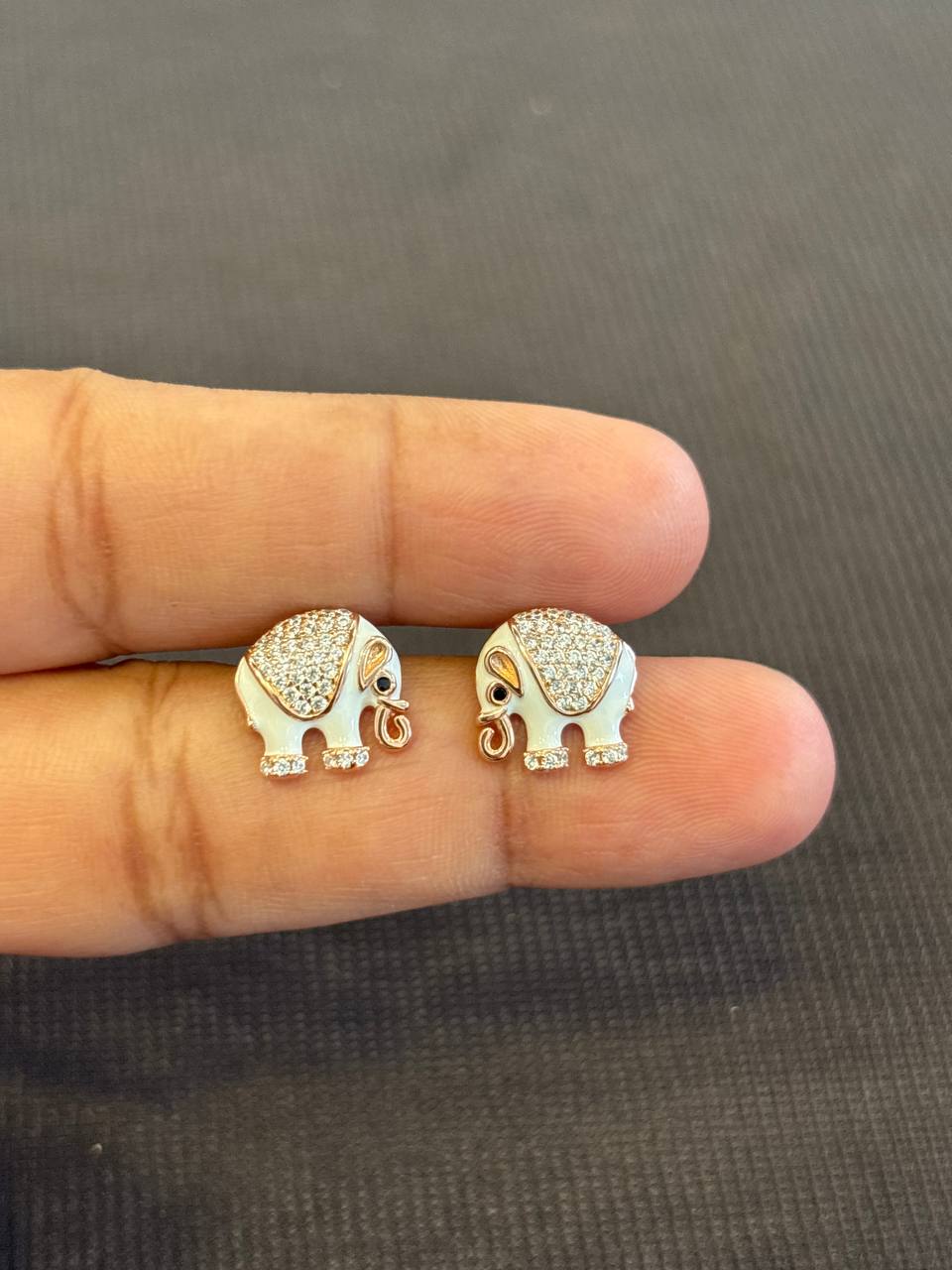 Silver white elephant stud with rosegold finish