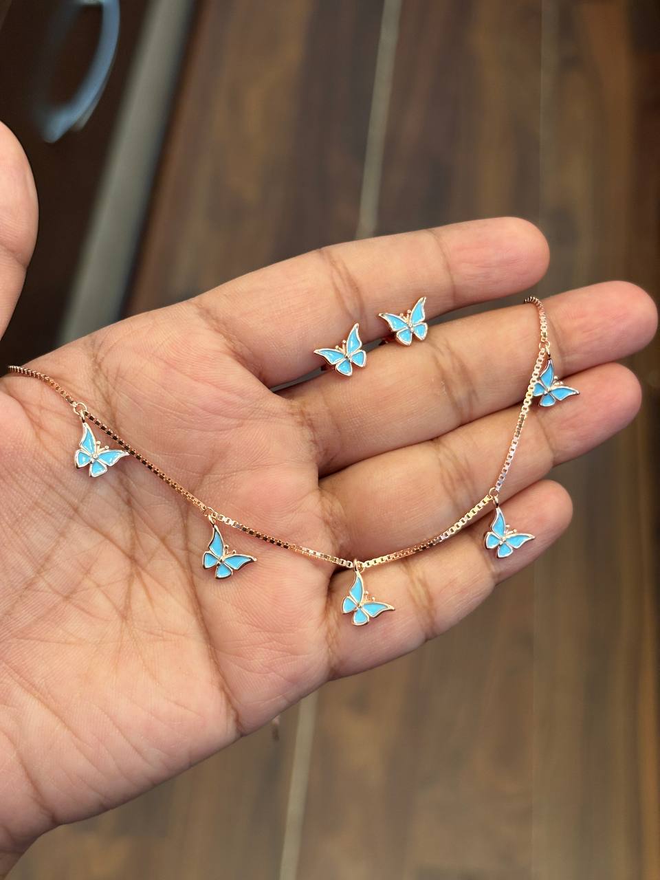 Silver butterflyy charm with rosegold finish