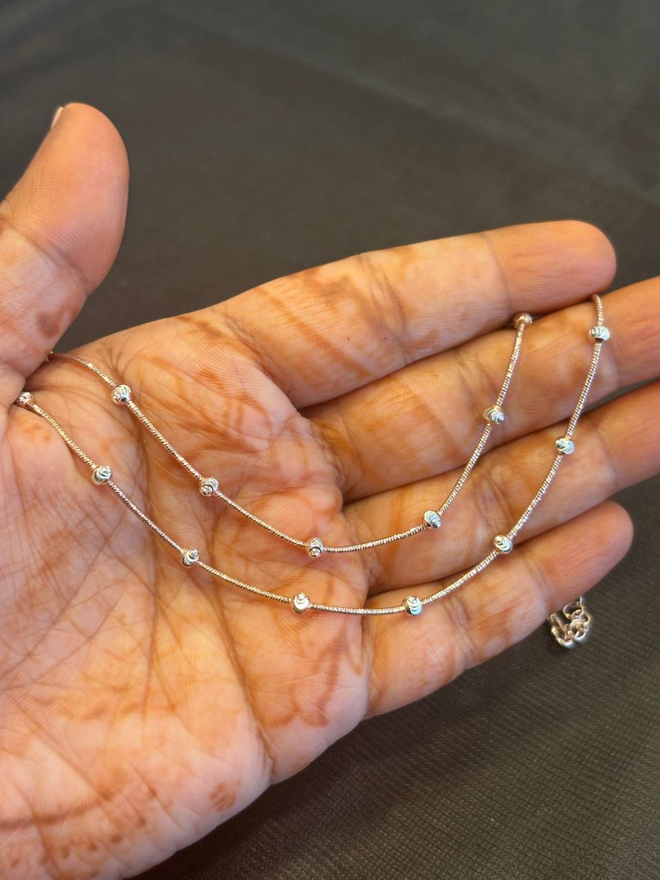 Silver aradhana anklet with dual tone