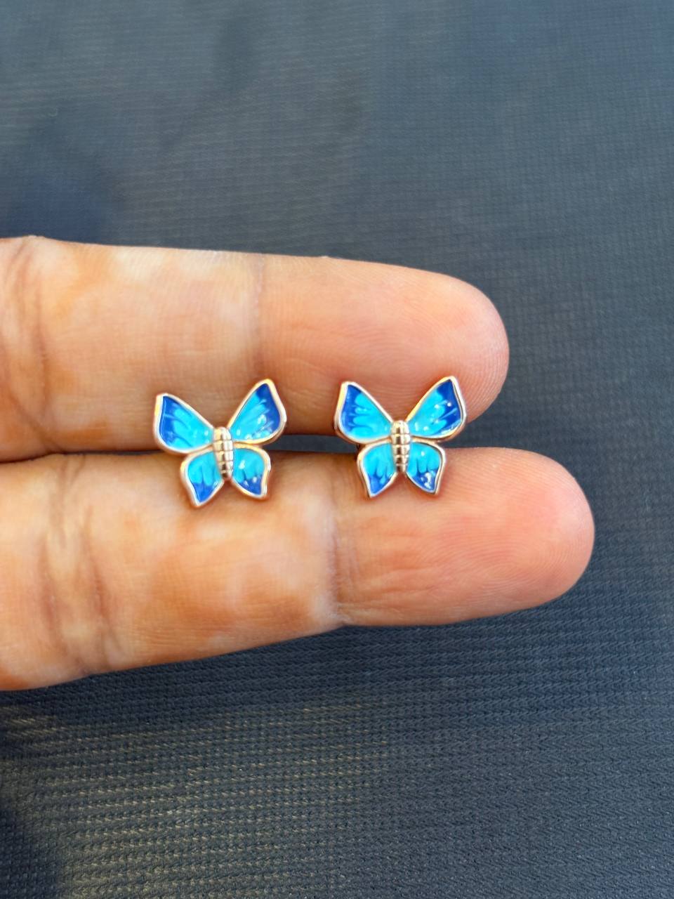 Silver blue butterfly stud with rosegold finish