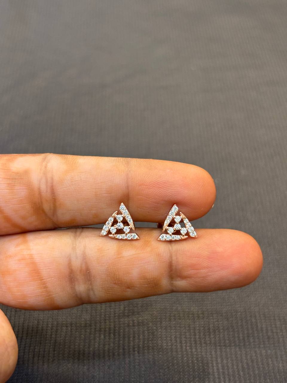 Silver tri stone stud with rosegold finish