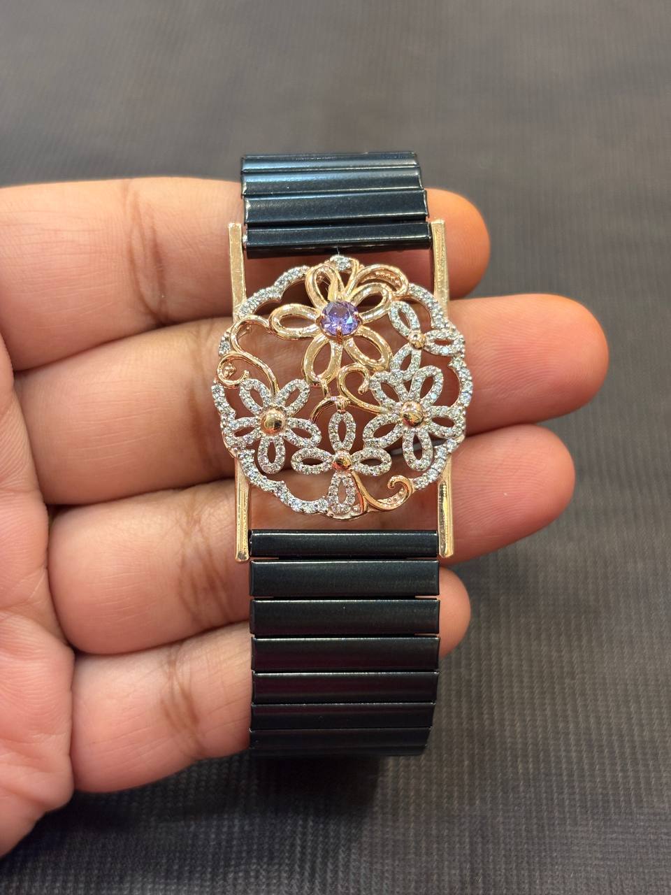 Silver Aadhira wrist band with rosegold finish