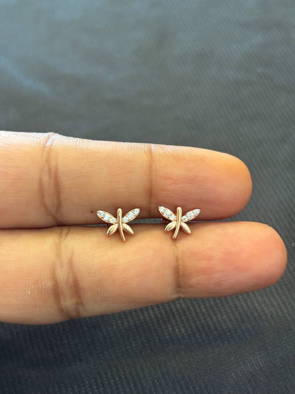 Silver fly stud with rosegold finish