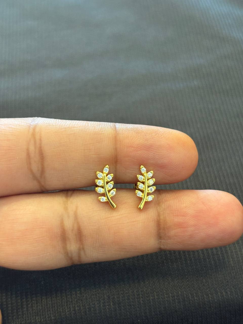 Silver lakshaya stud with gold finish