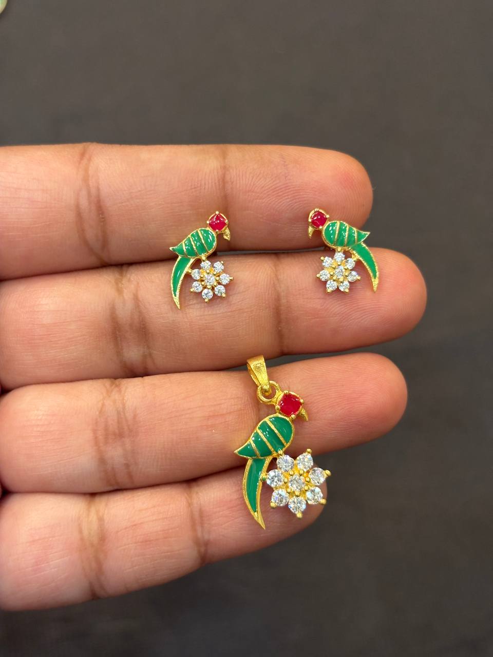 Silver parrot pendant set with gold finish