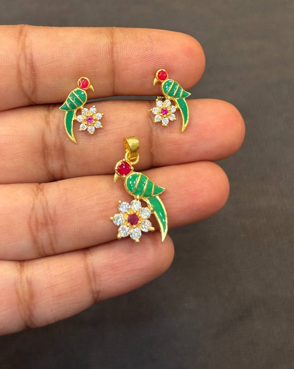 Silver parrot red pendant set with gold finish (without chain)