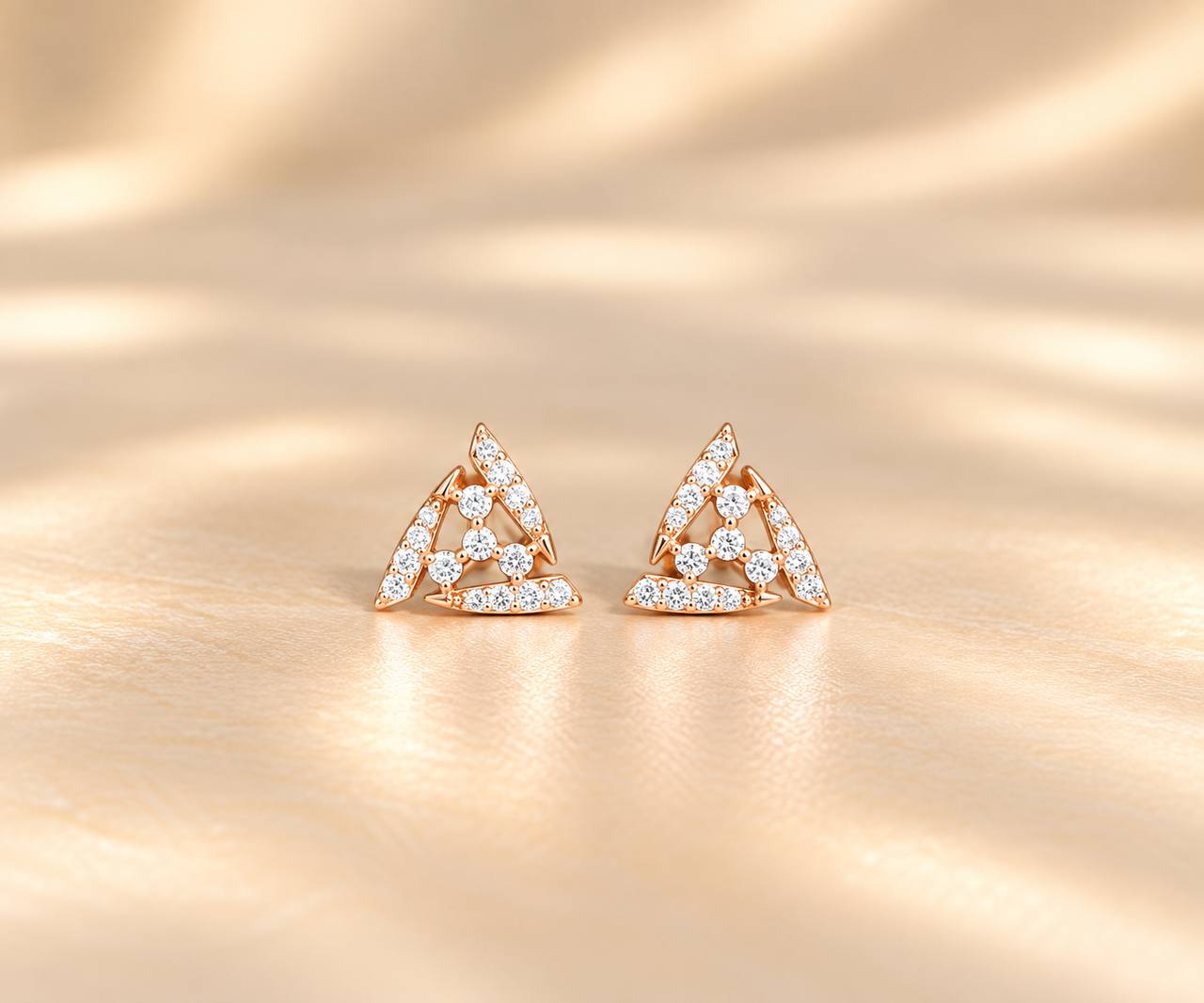 silver alagi stud with rosegold finish