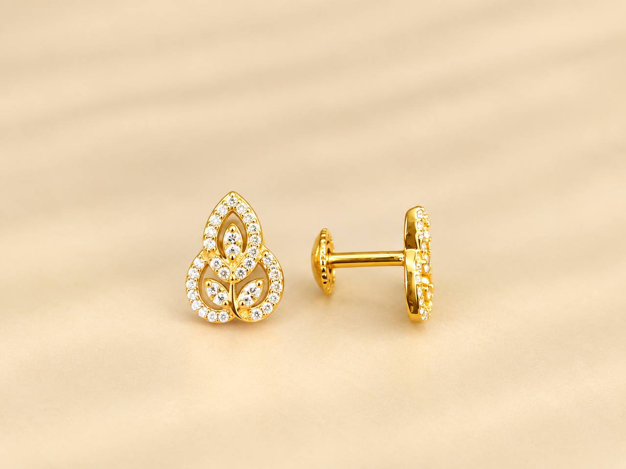 silver amutha stud with gold finish