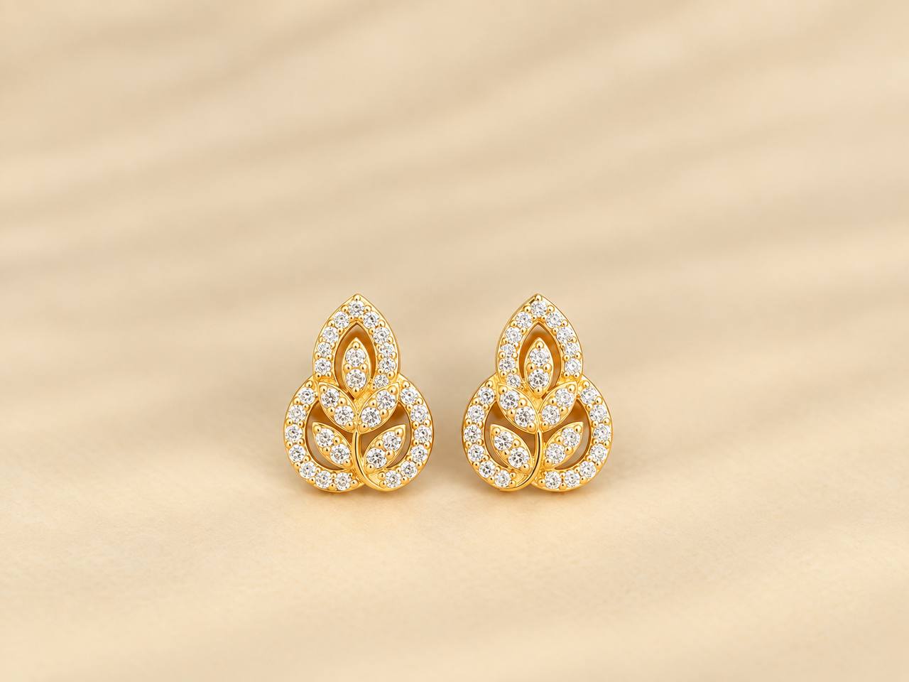 silver amutha stud with gold finish
