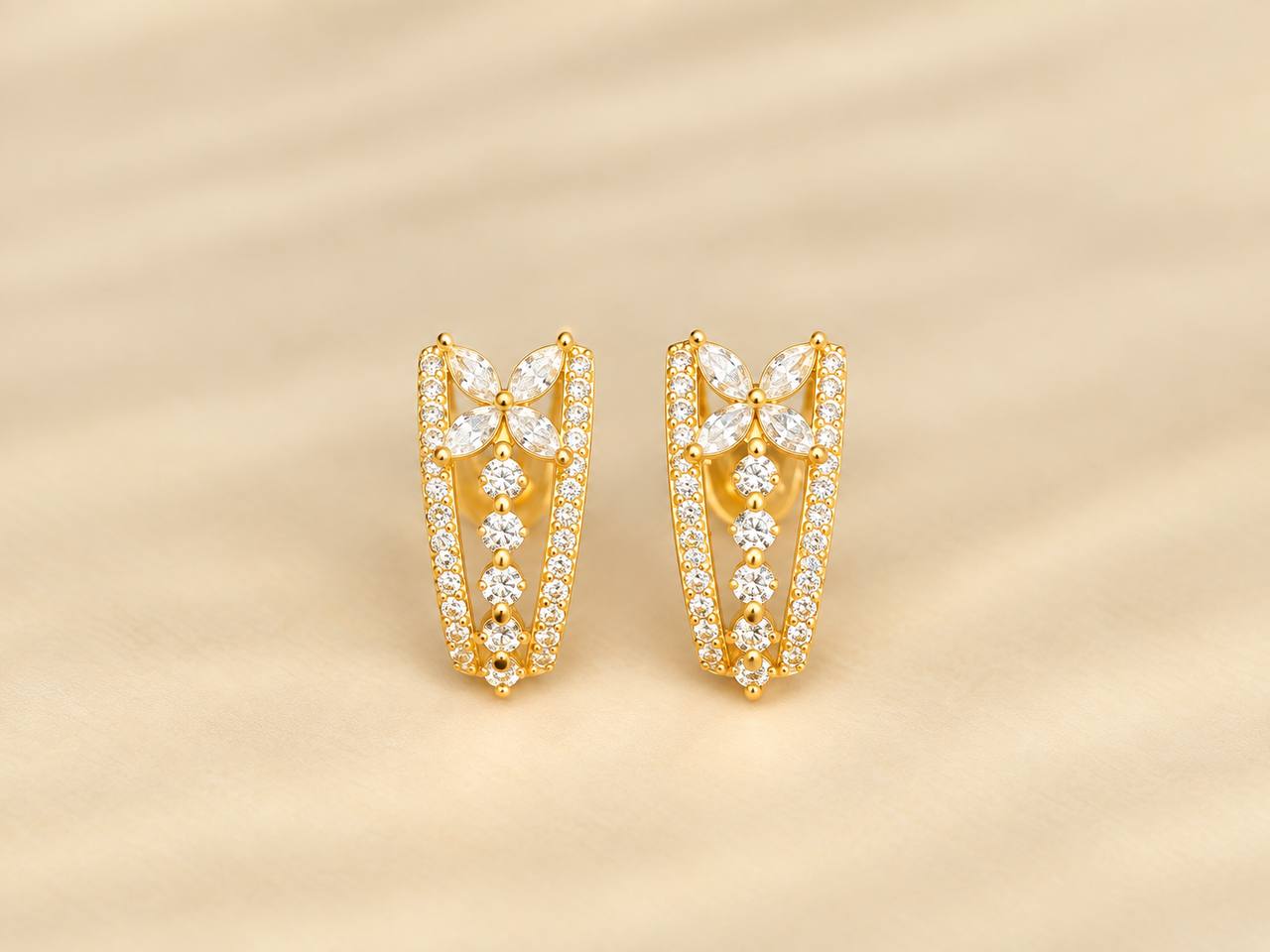 silver keerthi stud with gold finish