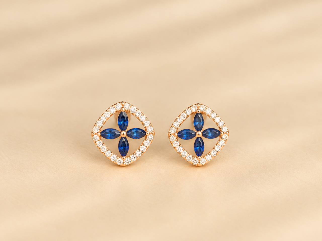 silver thendral blue stud with rosegold finish