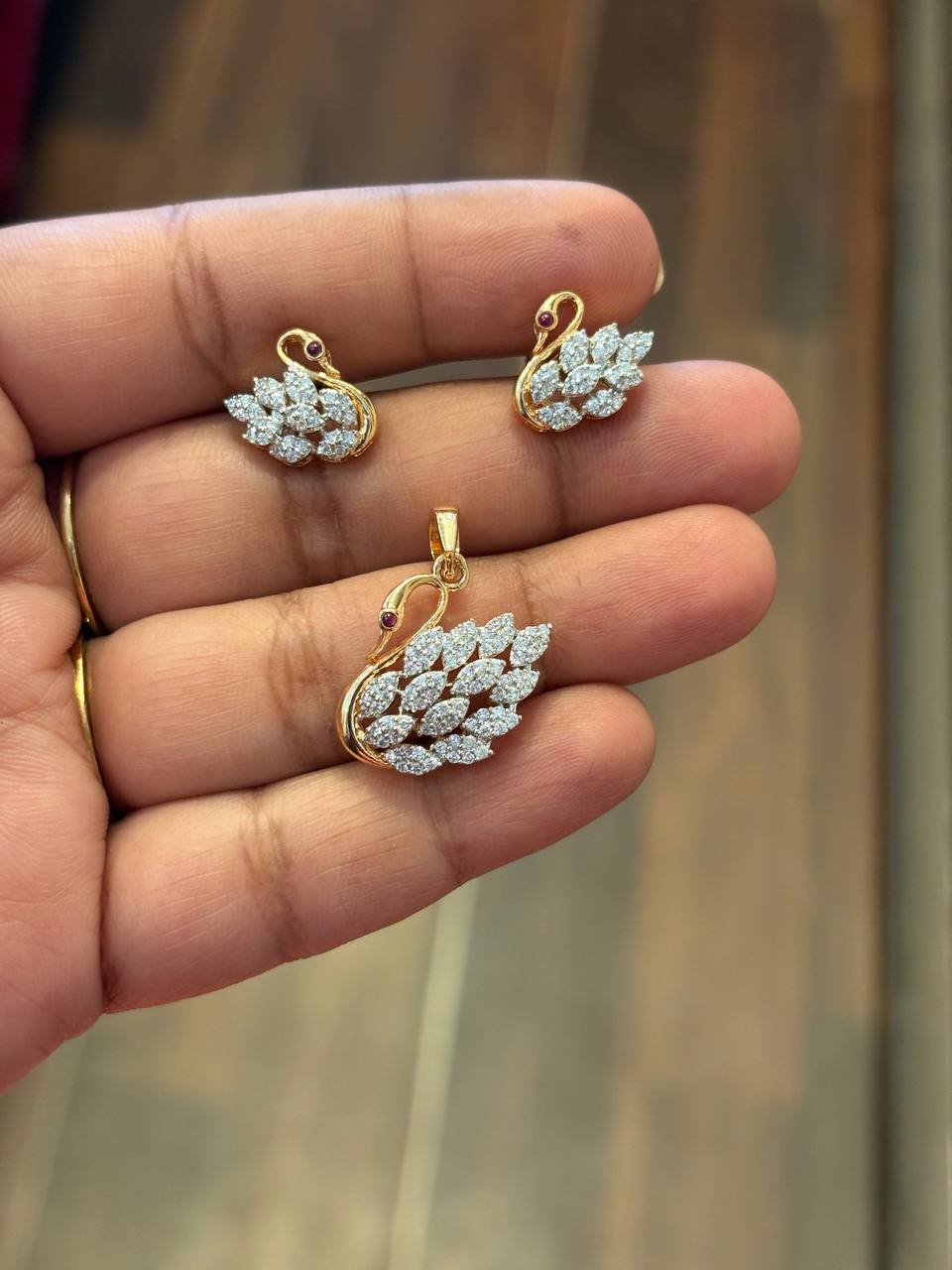Silver aadhira pendant set with gold finish(without chain)