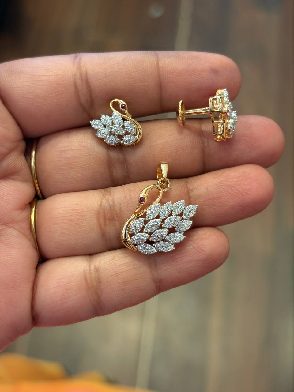 Silver aadhira pendant set with gold finish(without chain)