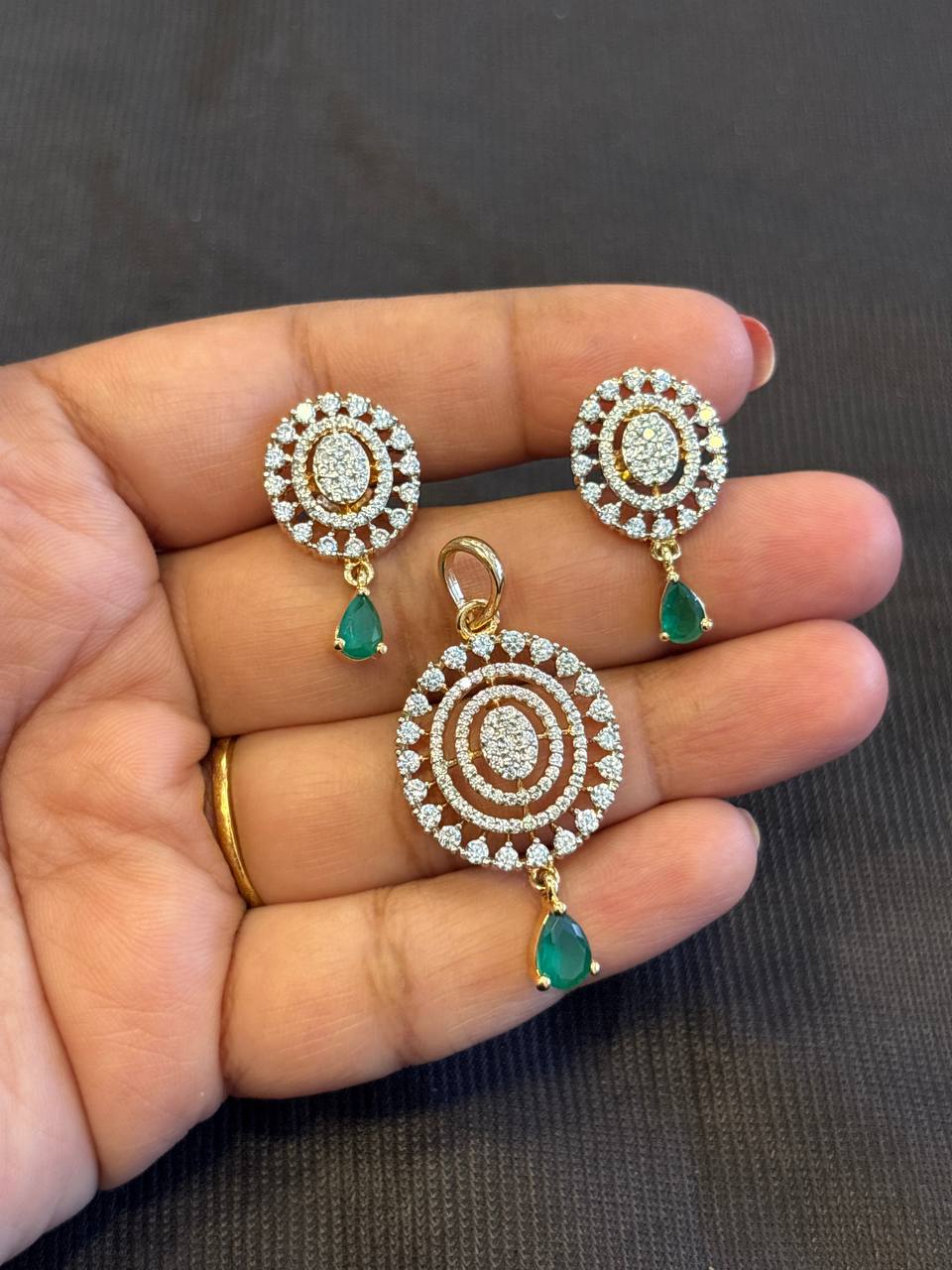 Silver mayuri green pendent set with gold finish(without chain)