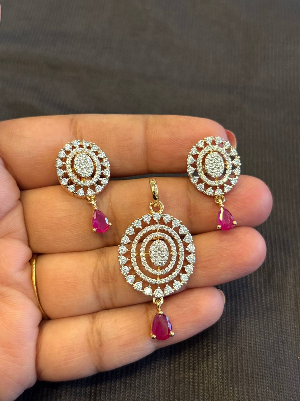 Silver mayuri pink pendent set with gold finish(without chain)