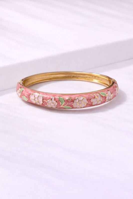 Pink enamel kada with blossoms