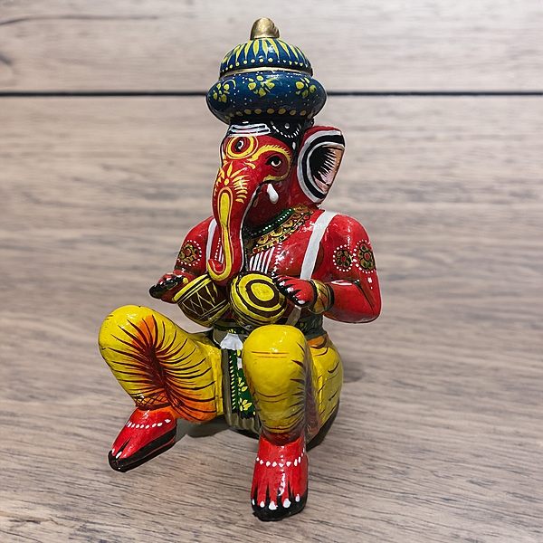 Playful Ganesha Wooden Statue