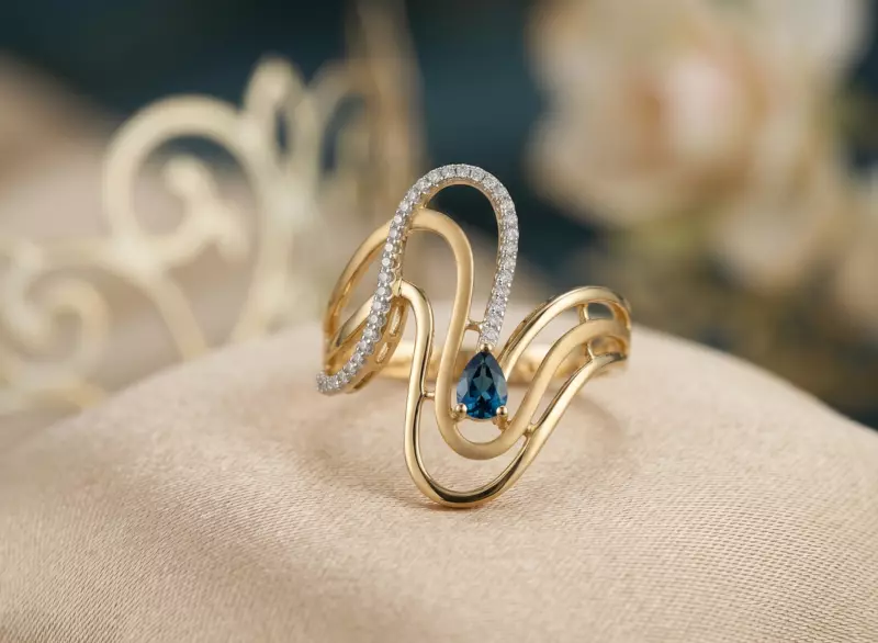 18 kt Gold Undulating Wave & Sapphire-Blue Ring