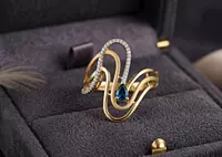 18 kt Gold Undulating Wave & Sapphire-Blue Ring