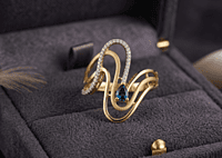 18 kt Gold Undulating Wave & Sapphire-Blue Ring
