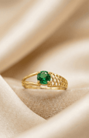 18 kt gold emerald weave ring