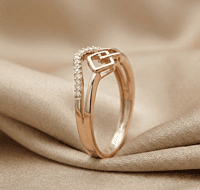 18 kt rose gold arch ring