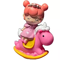 Small Girl Queen on Pink Unicorn Toy