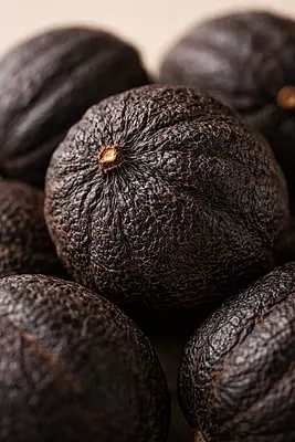 texture of naturally smoked black dried lemon