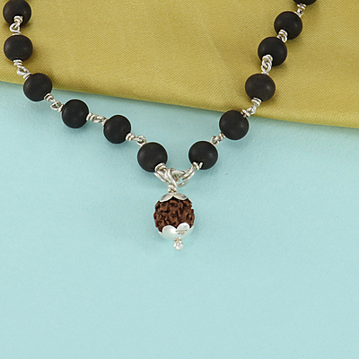 Silver Tied Wooden Beads ebony Mala (Black) with Rudraksha Pendant Silver Tied Wooden Beads ebony Mala (Black) with Rudraksha Pendant