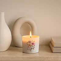 Pastel wildflower matte jar candle close-up — vanilla fragrance — clean burn