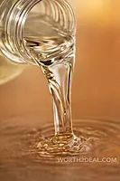 Close up of pure kerala coconut oil extracted using wooden ghani