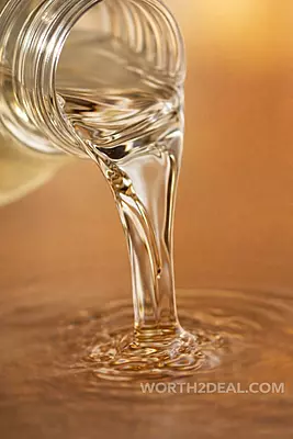 Close up of pure kerala coconut oil extracted using wooden ghani