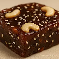 close up of mixed fruit halwa showing glossy chewy texture and nuts