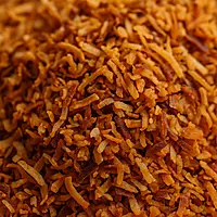 Close up of Worth2Deal Toasted Coconut Flakes showing golden roasted texture