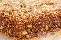 Close up of kunafa halwa texture with vermicelli strands