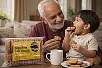 Elderly man and toddler enjoying Worth2Deal sugar-free oats biscuits at home