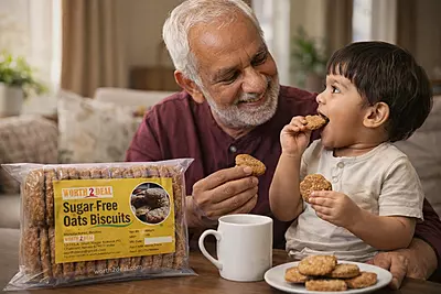 Elderly man and toddler enjoying Worth2Deal sugar-free oats biscuits at home