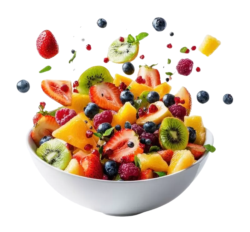 A ceramic bowl contains shattering fruits above that.